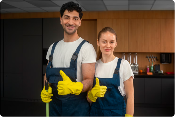 Man and woman cleaners smiling with thumbs-up